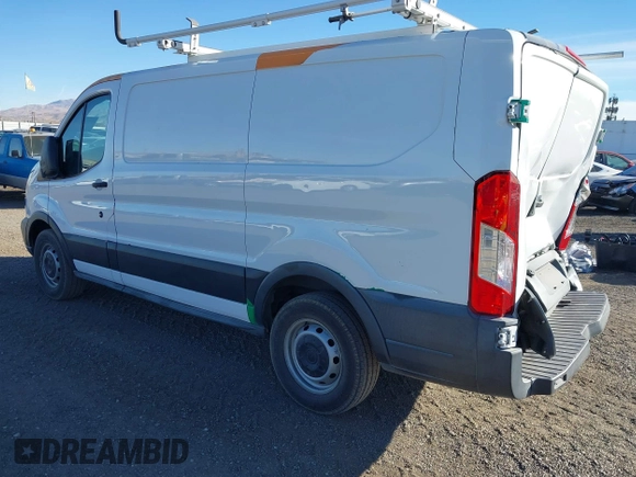 2016 Ford Transit Cargo z VIN 1FTYE1YM2GKB18602, wystawiony jako IAAI lot #41091180 z przebiegiem 143 262 mil mil oraz . Historia ofert i sprzedaży dostępna na DreamBid. Obrazek 3.
