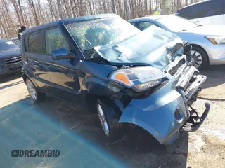 2011 Kia Soul + with VIN KNDJT2A20B7240358, listed as a IAAI auction lot 41890859 with 113,773 mi miles. Bid and sale history available at carsss.com. Image 1.