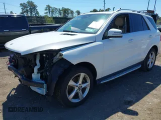 2018 Mercedes-Benz GLE 350 with VIN 4JGDA5HB1JB042700, listed as a IAAI auction lot 42052645 with 77,740 mi miles and . Bid and sale history available at DreamBid. Image 2.