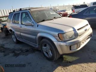 2002 Infiniti QX4 Luxury z VIN JNRDR09Y82W261103, wystawiony jako Copart lot #72452414 z przebiegiem 256 625 mil mil oraz Szkody całkowita. Historia ofert i sprzedaży dostępna na DreamBid. Obrazek 4.