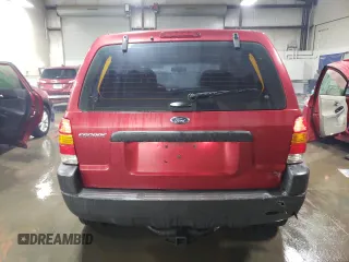 2004 Ford Escape XLS with VIN 1FMYU021X4DA05312, listed as a Copart auction lot 86185954 with 186,010 mi miles and Salvage Title. Bid and sale history available at DreamBid. Image 6.