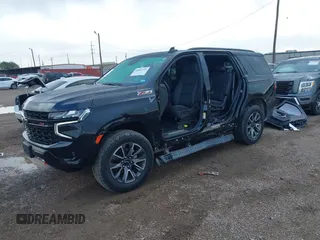 2023 Chevrolet Tahoe Z71 with VIN 1GNSKPKD9PR389603, listed as a IAAI auction lot 42082916 with 33,843 mi miles and . Bid and sale history available at DreamBid. Image 2.