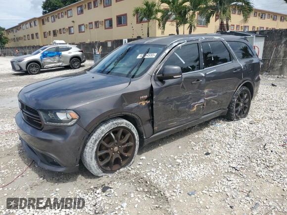 2015 Dodge Durango R/T with VIN 1C4SDHCT1FC891781, listed as a Copart auction lot 62664555 with 107,573 mi miles and Salvage title. Bid and sale history available at DreamBid. Image 1.