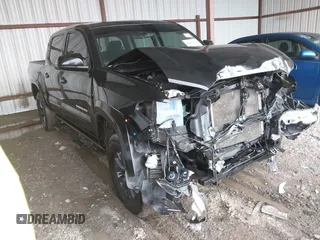 2023 Toyota Tacoma 4WD SR with VIN 3TMCZ5AN8PM538298, listed as a IAAI auction lot 41472145 with 66,484 mi miles. Bid and sale history available at carsss.com. Image 1.