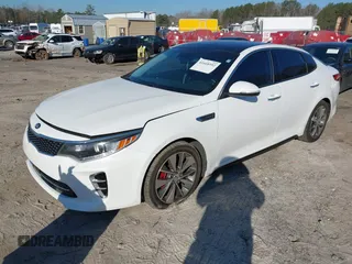 2016 Kia Optima SX Turbo with VIN 5XXGW4L2XGG084628, listed as a IAAI auction lot 41668592 with 116,535 mi miles and . Bid and sale history available at carsss.com. Image 17.