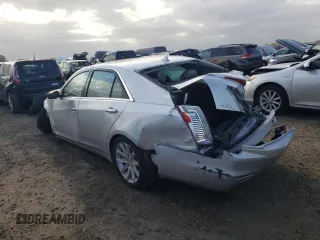 2014 Cadillac CTS Luxury AWD with VIN 1G6AX5SX6E0140605, listed as a Copart auction lot 73649144 with Not Provided miles and Clean Title. Bid and sale history available at DreamBid. Image 2.