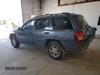 2004 Jeep Grand Cherokee Laredo z VIN 1J4GW48S14C338788, wystawiony jako Copart lot #53136715 z przebiegiem 150 352 mil mil oraz Szkoda całkowita • Salvage title. Historia ofert i sprzedaży dostępna na DreamBid. Obrazek 2.