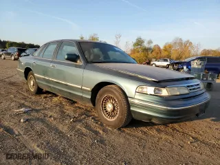 1996 Ford Crown Victoria LX with VIN 2FALP74W5TX146843, listed as a Copart auction lot 77251964 with 74,559 mi miles and Clean Title. Bid and sale history available at carsss.com. Image 4.