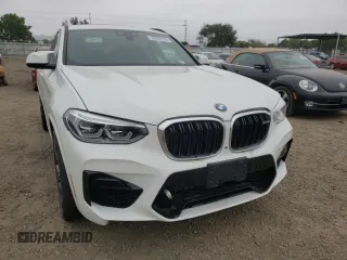 2020 BMW X4 M Competition z VIN 5YMUJ0C08L9B43928, wystawiony jako Copart lot #63555382 z przebiegiem 12 701 mil mil oraz . Historia ofert i sprzedaży dostępna na DreamBid. Obrazek 9.