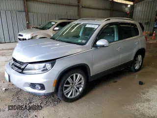 2013 Volkswagen Tiguan SE with VIN WVGBV7AX1DW504036, listed as a Copart auction lot 61126145 with 148,399 mi miles and Salvage title. Bid and sale history available at DreamBid. Image 1.