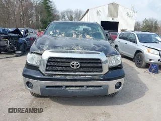 2007 Toyota Tundra SR5 z VIN 5TFBT54117X005726, wystawiony jako IAAI lot #42105716 z przebiegiem 84 828 mil mil oraz . Historia ofert i sprzedaży dostępna na DreamBid. Obrazek 12.