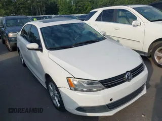 2013 Volkswagen Jetta TDI w/Premium/Nav with VIN 3VWLL7AJ7DM401310, listed as a IAAI auction lot 42690046 with 167,612 mi miles and . Bid and sale history available at DreamBid. Image 1.