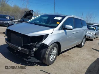 2016 Kia Sedona LX with VIN KNDMB5C12G6157582, listed as a IAAI auction lot 41932306 with 106,061 mi miles. Bid and sale history available at carsss.com. Image 2.