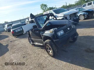 1995 Geo Tracker z VIN 2CNBE18U7S6904490, wystawiony jako IAAI lot #39596307 z przebiegiem 223 933 mil mil oraz . Historia ofert i sprzedaży dostępna na DreamBid. Obrazek 1.