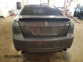 2009 Pontiac G8 z VIN 6G2ER57739L205634, wystawiony jako Copart lot #58935145 z przebiegiem 181 490 mil mil oraz Czysty tytuł • Clean title. Historia ofert i sprzedaży dostępna na DreamBid. Obrazek 6.