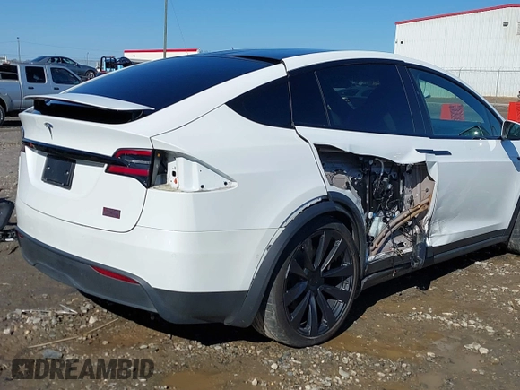 2022 Tesla Model X Plaid z VIN 7SAXCBE64NF352928, wystawiony jako IAAI lot #41406070 z przebiegiem 38 175 mil mil oraz . Historia ofert i sprzedaży dostępna na DreamBid. Obrazek 6.