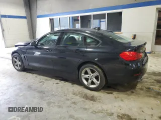 2015 BMW 4 Series 428i xDrive with VIN WBA4A7C52FD415821, listed as a Copart auction lot 51622295 with 63,918 mi miles and Salvage title. Bid and sale history available at DreamBid. Image 2.