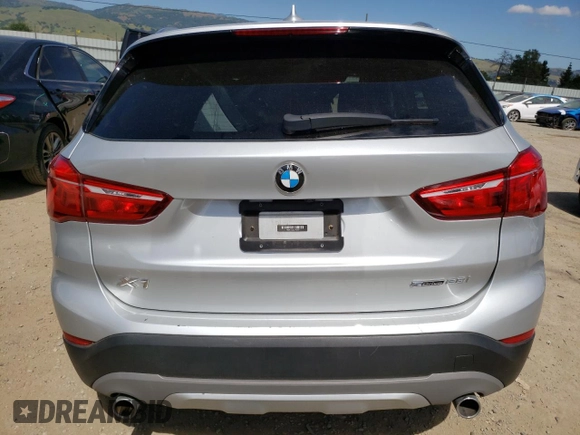 2018 BMW X1 sDrive28i with VIN WBXHU7C38J3H42948, listed as a Copart auction lot 52061793 with 26,991 mi miles and . Bid and sale history available at DreamBid. Image 6.