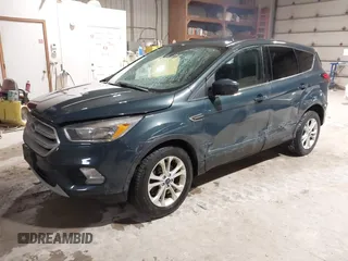 2019 Ford Escape SE z VIN 1FMCU9GDXKUA54699, wystawiony jako IAAI lot #41667188 z przebiegiem 127 376 mil mil oraz . Historia ofert i sprzedaży dostępna na DreamBid. Obrazek 18.