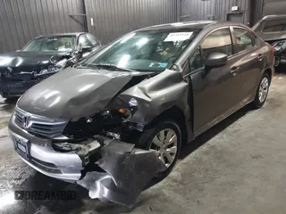 2012 Honda Civic LX z VIN 19XFB2F59CE373830, wystawiony jako IAAI lot #42312118 z przebiegiem 106 541 mil mil oraz . Historia ofert i sprzedaży dostępna na DreamBid. Obrazek 2.