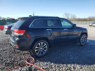 2017 Jeep Grand Cherokee Overland z VIN 1C4RJFCG9HC663433, wystawiony jako Copart lot #49231665 z przebiegiem 171 721 mil mil oraz Szkoda całkowita • Salvage title. Historia ofert i sprzedaży dostępna na DreamBid. Obrazek 3.