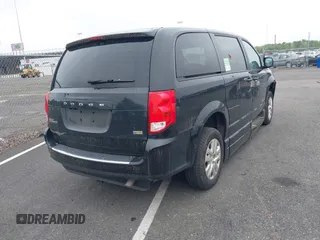 2018 Dodge Grand Caravan SE with VIN 2C7WDGBG5JR190468, listed as a IAAI auction lot 42173227 with 49,451 mi miles and . Bid and sale history available at DreamBid. Image 4.