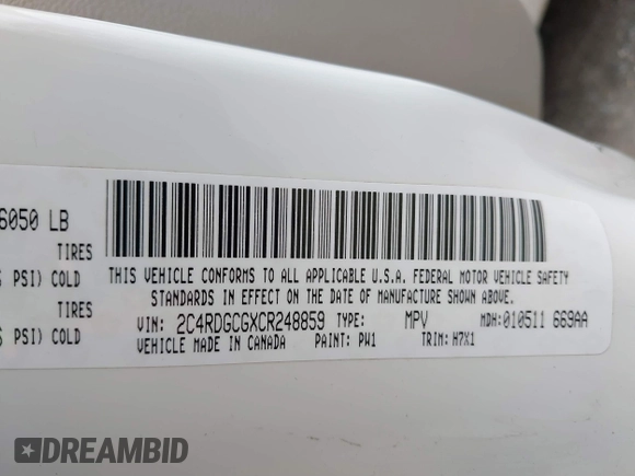 2012 Dodge Grand Caravan SXT with VIN 2C4RDGCGXCR248859, listed as a IAAI auction lot 41829411 with 111,515 mi miles and . Bid and sale history available at DreamBid. Image 9.