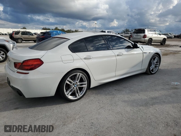 2016 BMW 6 Series 640i with VIN WBA6D0C57GG432671, listed as a Copart auction lot 86781034 with 118,161 mi miles and Salvage Title. Bid and sale history available at carsss.com. Image 3.