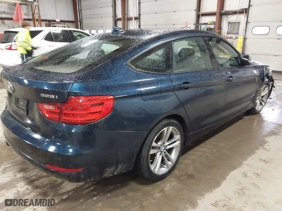2014 BMW 3 Series Gran Turismo 328i xDrive with VIN WBA3X5C5XED557668, listed as a IAAI auction lot 41728522 with 123,393 mi miles. Bid and sale history available at carsss.com. Image 4.