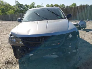 2019 Dodge Journey SE with VIN 3C4PDCBB7KT872524, listed as a IAAI auction lot 42093711 with 86,519 mi miles and . Bid and sale history available at DreamBid. Image 13.