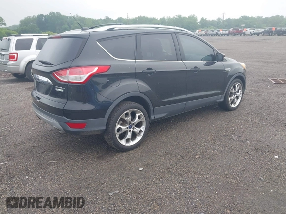 2015 Ford Escape Titanium z VIN 1FMCU0JX7FUB00462, wystawiony jako IAAI lot #42532943 z przebiegiem 88 623 mil mil oraz . Historia ofert i sprzedaży dostępna na DreamBid. Obrazek 4.