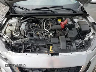 2023 Nissan Sentra S z VIN 3N1AB8BVXPY291356, wystawiony jako Copart lot #59021875 z przebiegiem 59 367 mil mil oraz Czysty tytuł • Clean title. Historia ofert i sprzedaży dostępna na DreamBid. Obrazek 11.