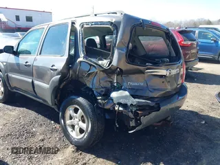 2006 Mazda Tribute i with VIN 4F2YZ92Z16KM25216, listed as a IAAI auction lot 41664006 with 228,222 mi miles and . Bid and sale history available at carsss.com. Image 6.