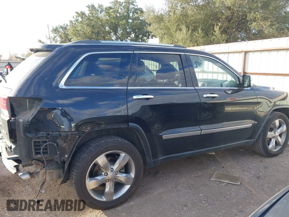 2013 Jeep Grand Cherokee Overland with VIN 1C4RJECT2DC546634, listed as a IAAI auction lot 41180807 with 111,897 mi miles. Bid and sale history available at carsss.com. Image 14.