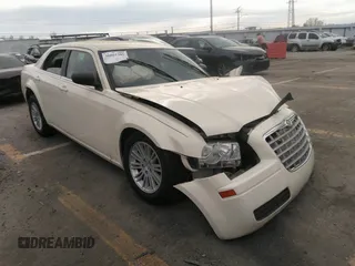 2009 Chrysler 300 LX with VIN 2C3KA43D79H554452, listed as a IAAI auction lot 38252211 with Not Provided miles and . Bid and sale history available at DreamBid. Image 1.