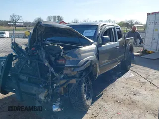 2015 Toyota Tacoma with VIN 5TFLU4ENXFX139145, listed as a IAAI auction lot 41822079 with 146,842 mi miles. Bid and sale history available at carsss.com. Image 2.