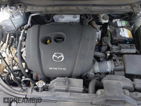 2020 Mazda CX-5 Touring with VIN JM3KFACM9L0785464, listed as a IAAI auction lot 42023311 with 90,062 mi miles and . Bid and sale history available at DreamBid. Image 10.