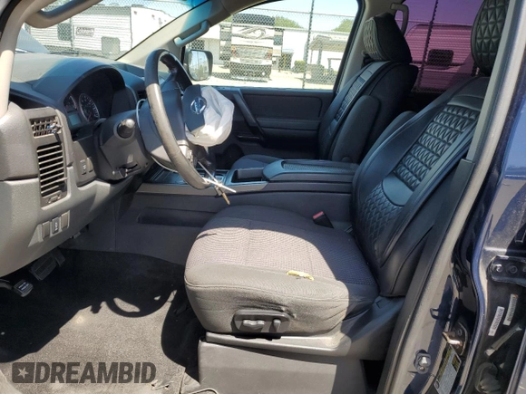 2012 Nissan Titan SV with VIN 1N6AA0ED3CN331091, listed as a Copart auction lot 57805625 with 106,693 mi miles and Salvage title. Bid and sale history available at DreamBid. Image 7.