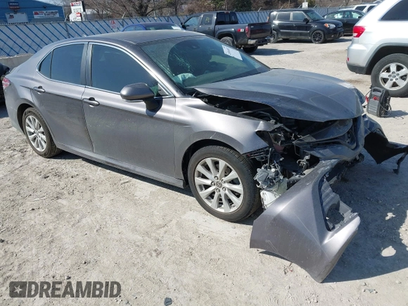 2019 Toyota Camry LE with VIN 4T1B11HK9KU810347, listed as a IAAI auction lot 41804007 with 75,063 mi miles and . Bid and sale history available at DreamBid. Image 1.