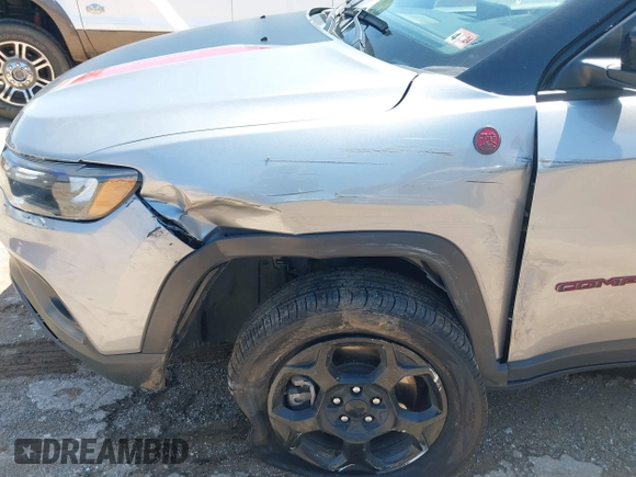 2023 Jeep Compass Trailhawk with VIN 3C4NJDDN3PT527995, listed as a IAAI auction lot 42218464 with 47,701 mi miles and . Bid and sale history available at DreamBid. Image 6.