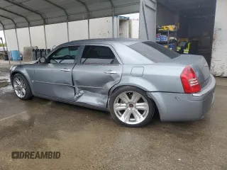 2006 Chrysler 300 C with VIN 2C3KA63H26H218136, listed as a Copart auction lot 49209315 with 215,682 mi miles and Salvage Title. Bid and sale history available at carsss.com. Image 2.