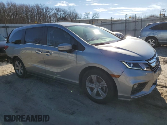 2020 Honda Odyssey EX-L with VIN 5FNRL6H73LB056720, listed as a Copart auction lot 87205024 with 60,219 mi miles and Salvage Title. Bid and sale history available at carsss.com. Image 4.