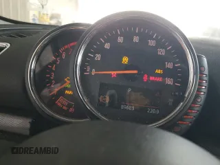 2016 MINI Clubman z VIN WMWLN5C51G2B28099, wystawiony jako Copart lot #55139845 z przebiegiem 89 683 mil mil oraz Szkoda całkowita • Salvage title. Historia ofert i sprzedaży dostępna na DreamBid. Obrazek 9.