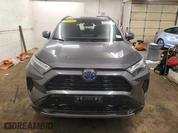 2022 Toyota RAV4 Hybrid SE z VIN 4T3T6RFVXNU086035, wystawiony jako Copart lot #61029535 z przebiegiem 52 174 mil mil oraz Szkoda całkowita • Salvage title. Historia ofert i sprzedaży dostępna na DreamBid. Obrazek 5.