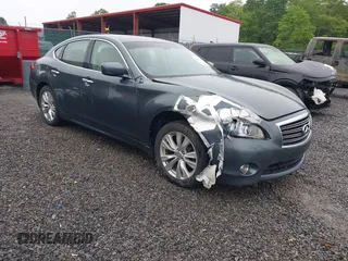 2011 Infiniti M with VIN JN1BY1AR1BM372336, listed as a IAAI auction lot 42295596 with 208,718 mi miles and . Bid and sale history available at DreamBid. Image 1.