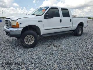 2000 Ford F-350 XL with VIN 1FTSW31L1YEC57247, listed as a Copart auction lot 63279605 with 145,075 mi miles and Salvage title. Bid and sale history available at DreamBid. Image 1.