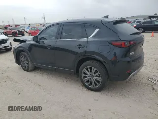 2024 Mazda CX-5 2.5 Turbo Signature with VIN JM3KFBXYXR0366308, listed as a Copart auction lot 83253424 with 8,741 mi miles and Salvage Title. Bid and sale history available at carsss.com. Image 2.