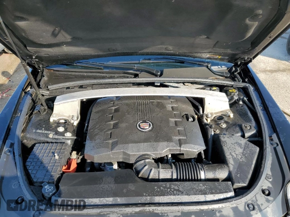 2012 Cadillac CTS Premium z VIN 1G6DS1E35C0105144, wystawiony jako Copart lot #71043834 z przebiegiem 126 227 mil mil oraz Szkoda całkowita • Salvage title. Historia ofert i sprzedaży dostępna na DreamBid. Obrazek 11.