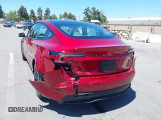 2025 Tesla Model 3 Long Range with VIN 5YJ3E1EA6SF917745, listed as a IAAI auction lot 42533673 with 7,305 mi miles and . Bid and sale history available at DreamBid. Image 6.