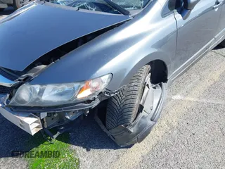 2009 Honda Civic LX z VIN 19XFA16539E021784, wystawiony jako IAAI lot #41674944 z przebiegiem 52 474 mil mil oraz . Historia ofert i sprzedaży dostępna na DreamBid. Obrazek 17.